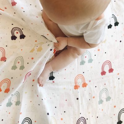 Rainbow muslin baby swaddle blanket Charlie Rowan Designs